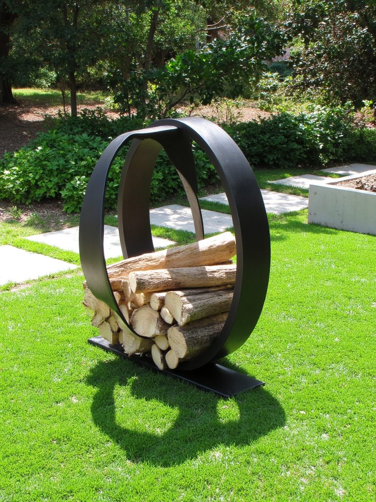 sculptural steel firewood holder
